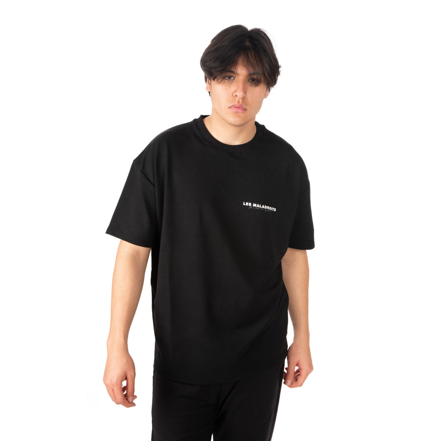 Unisex Oversized Black T-shirt Le Club des Gamins zoomed view on male model