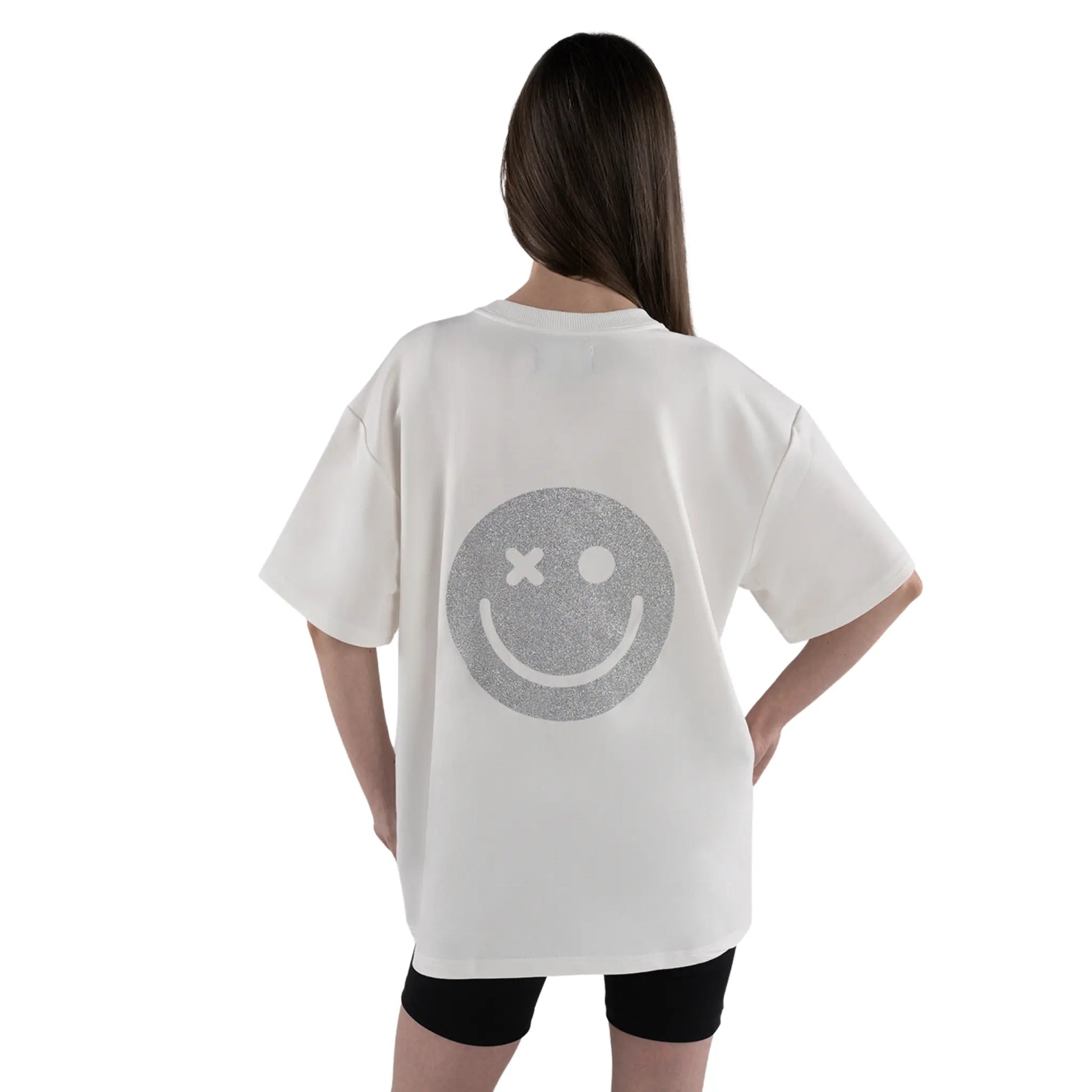 Glitter Smiley Oversized T-shirt White on brunette woman wearing shorts close up view on back logo