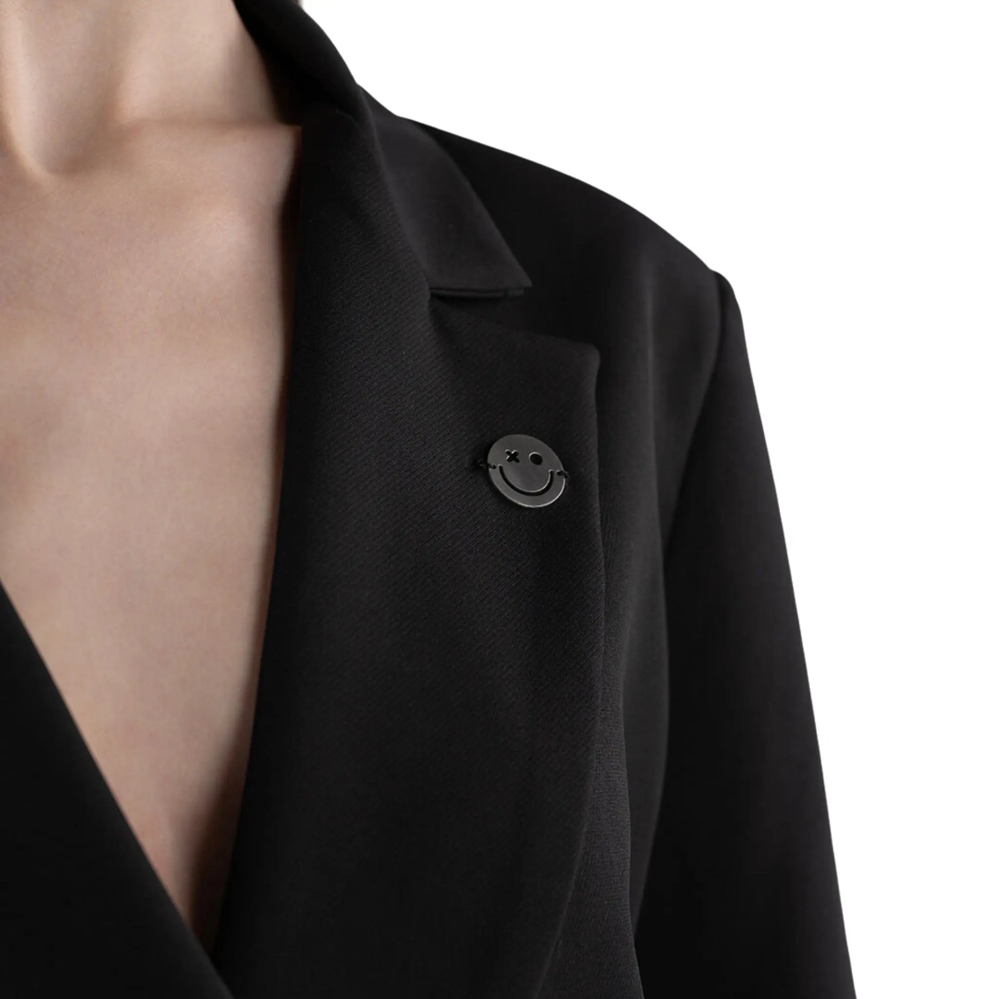 Double-Breasted Blazer & High-Waist Trousers Set close up on logo