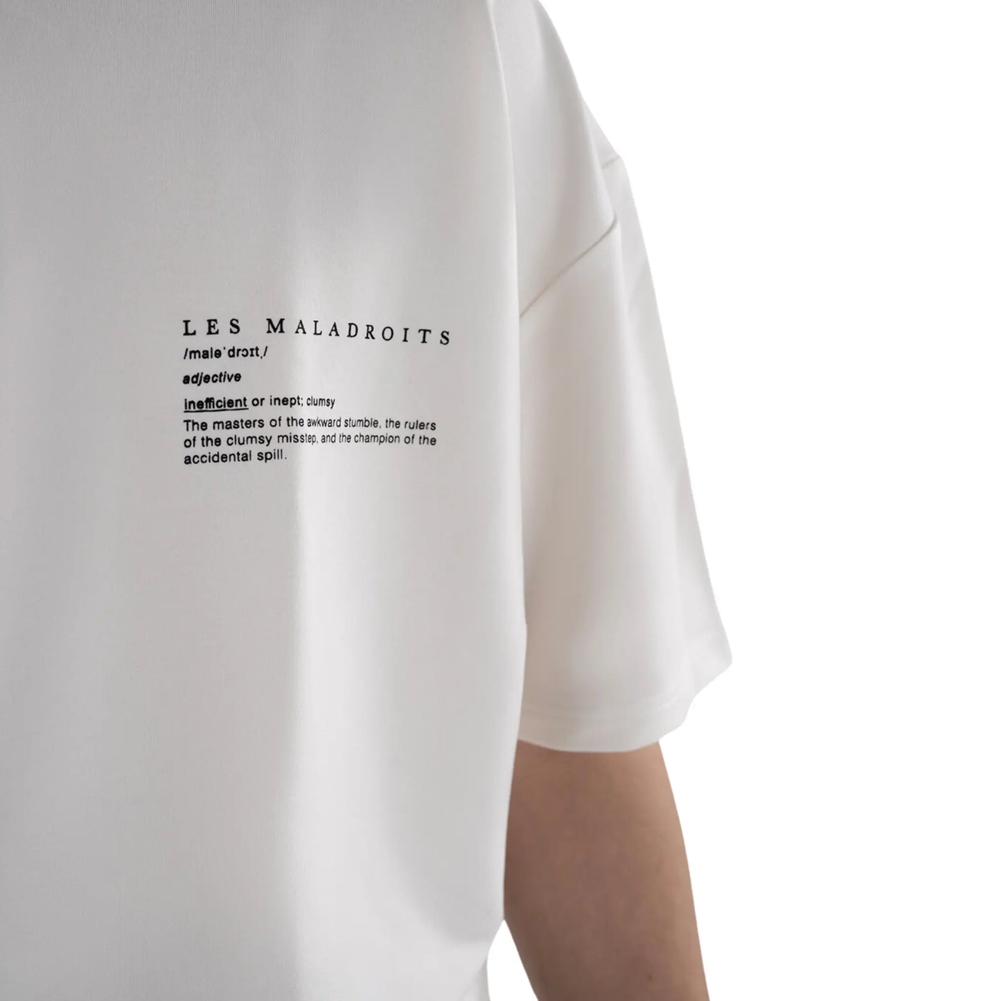 Oversized T-Shirt White Les Maladroits Definition close-up view on the definition 