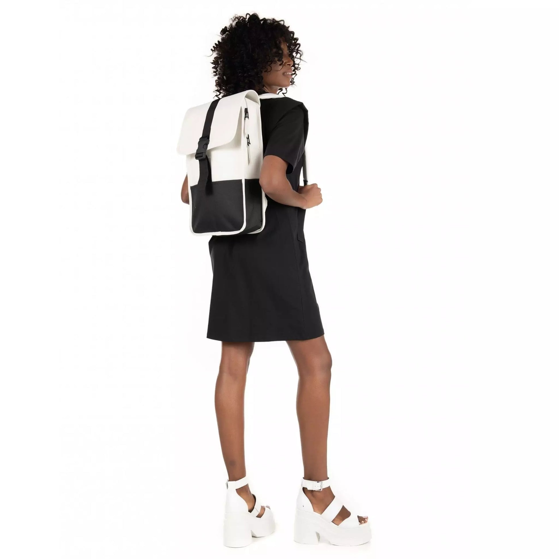 Rains waterproof buckle backpack mini off white black worn by women