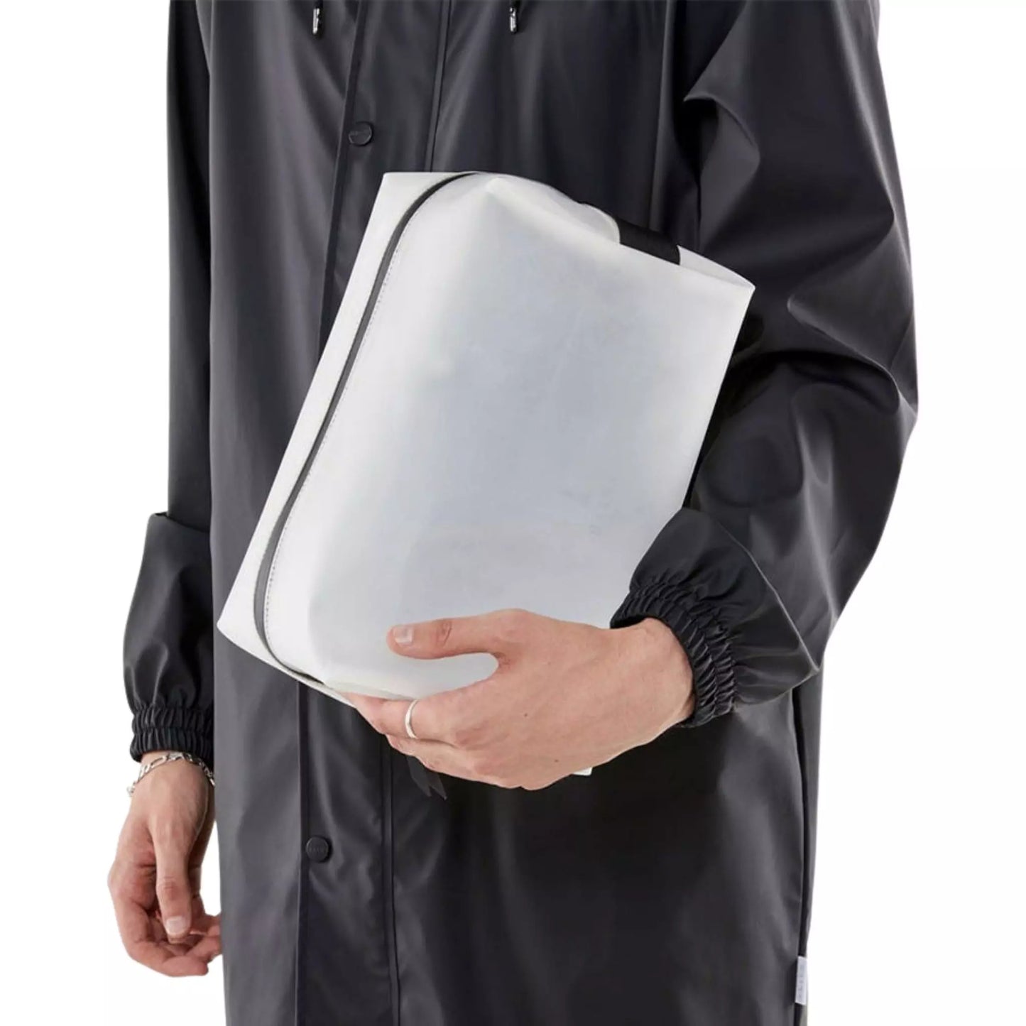 Rains waterproof wash bag large foggy white held by man